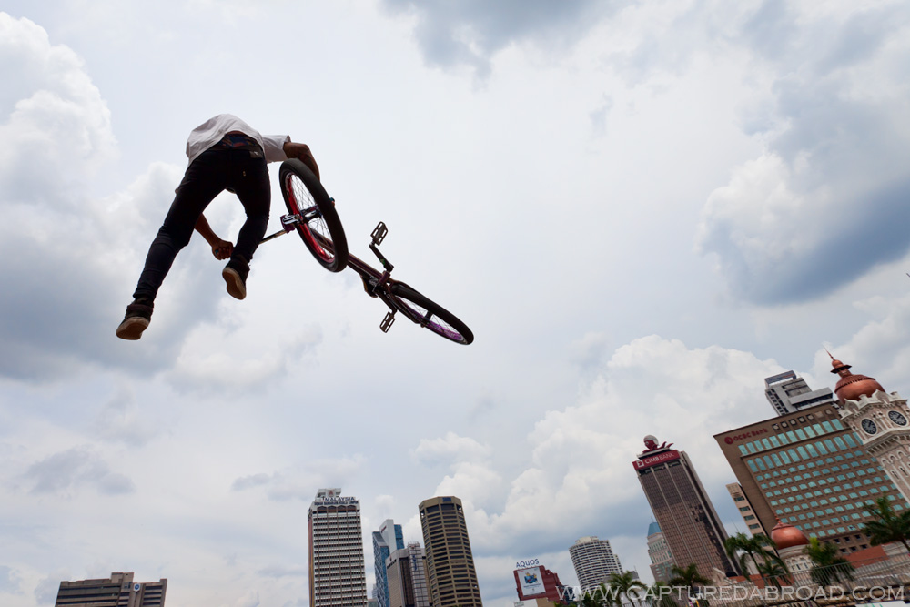 Click image to purchase BMX Flying high over Merdeka Square, Kuala Lumpur