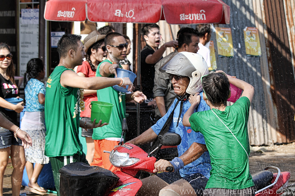 Pi Mai Celebrations in Vientiane, Laos, water festival, scared man