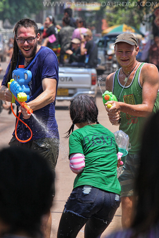 Pi Mai Celebrations in Vientiane, Laos, water pistol