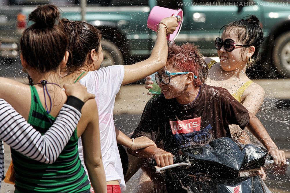 Pi Mai Celebrations in Vientiane, Laos, scooter, flour, water
