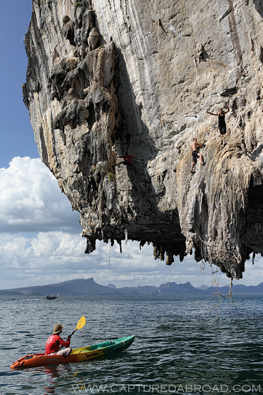 Deep water soloing on cliffs off Ton Sai beach, Krab