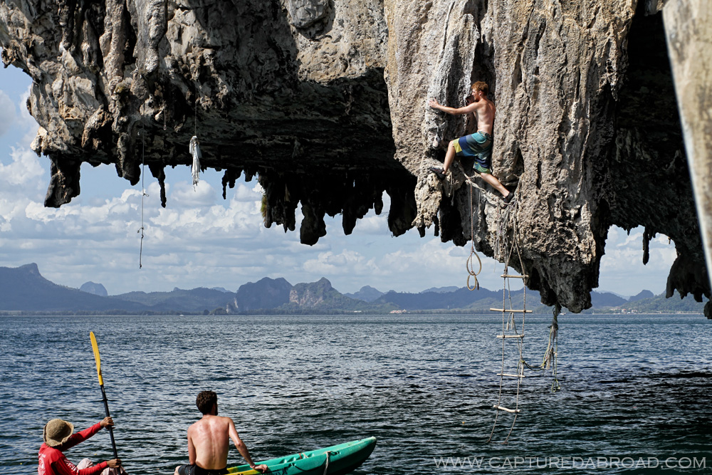 Deep water soloing on cliffs off Ton Sai beach, Krab