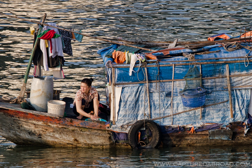 Women washing in boat, Vietnam Cat Ba