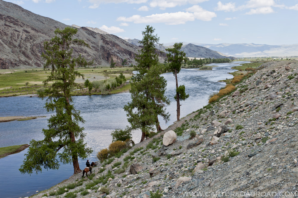 Horse by the river through Tsengel, Bayan-Ölgii‎ Mongolia