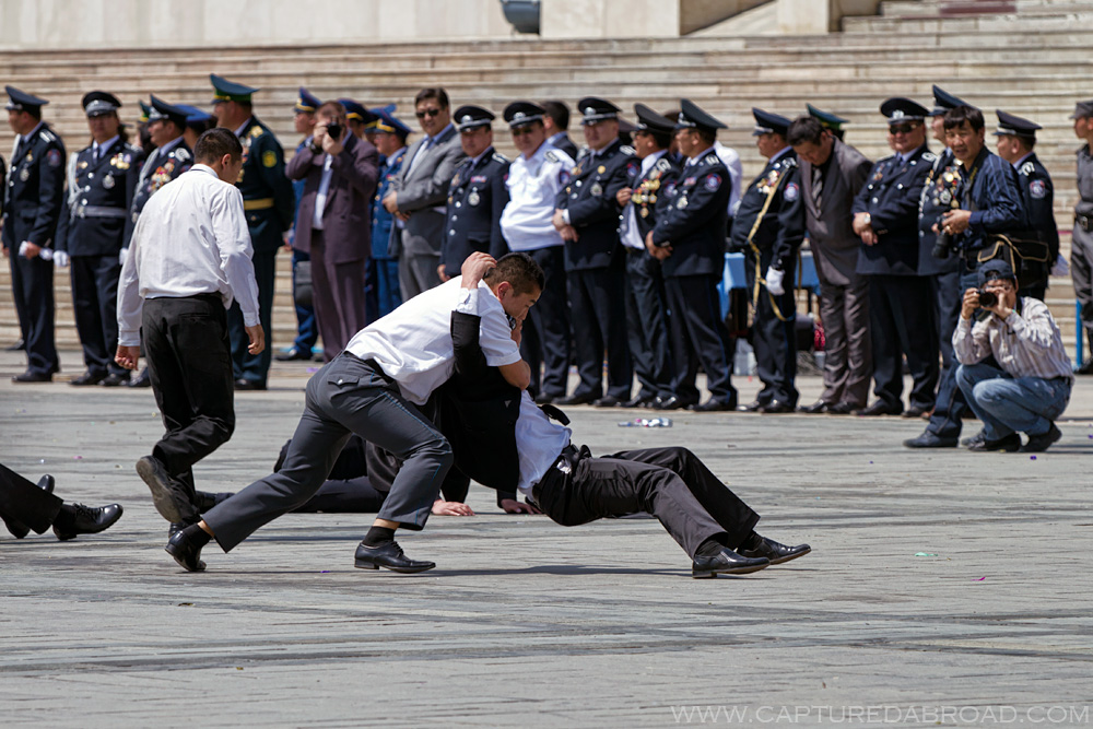 Mock fighting in Sukhbaatar square, Ulan Bator Mongolia