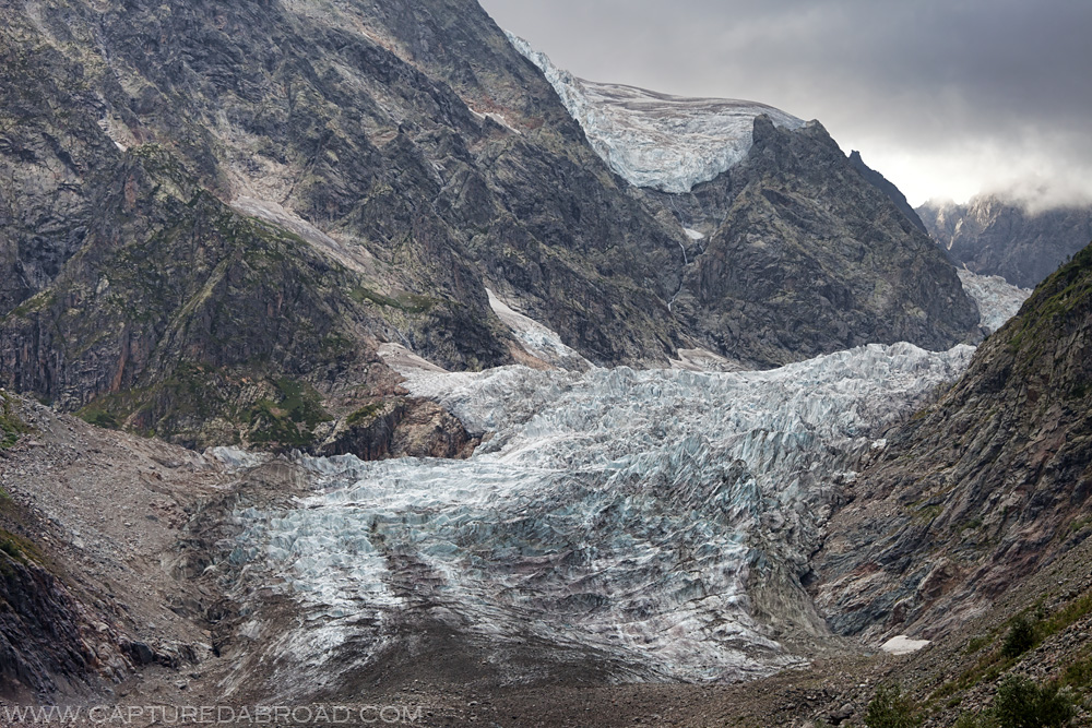 Svaneti Chaaladi glacier makes it's way slowly down the gorge